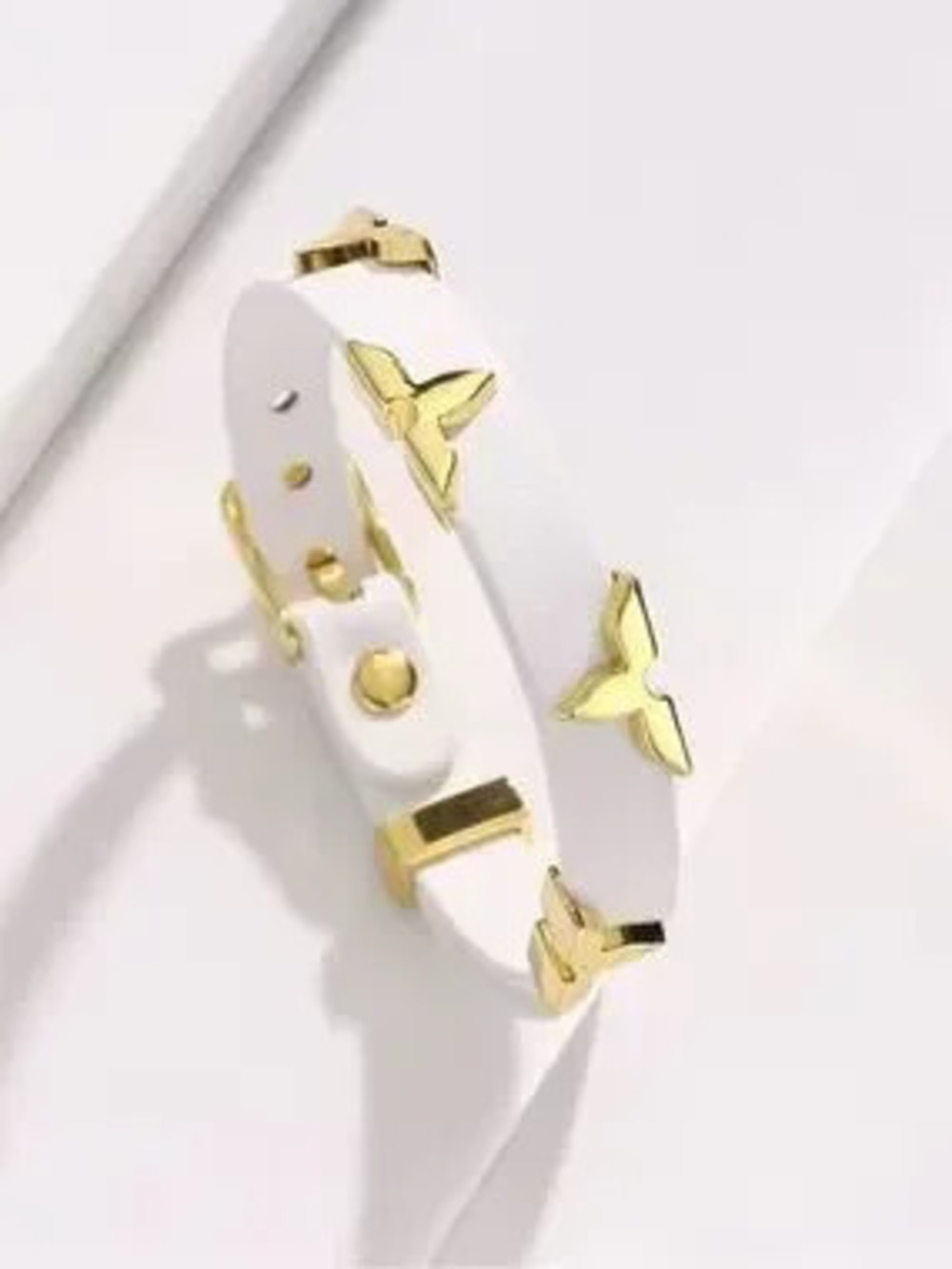 Modern White Leather Bracelet with Gold Butterfly Accents